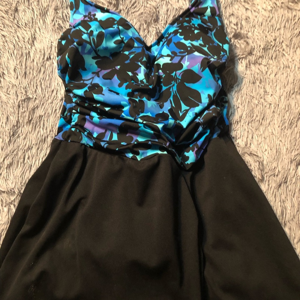 Bathing suit with skirt.